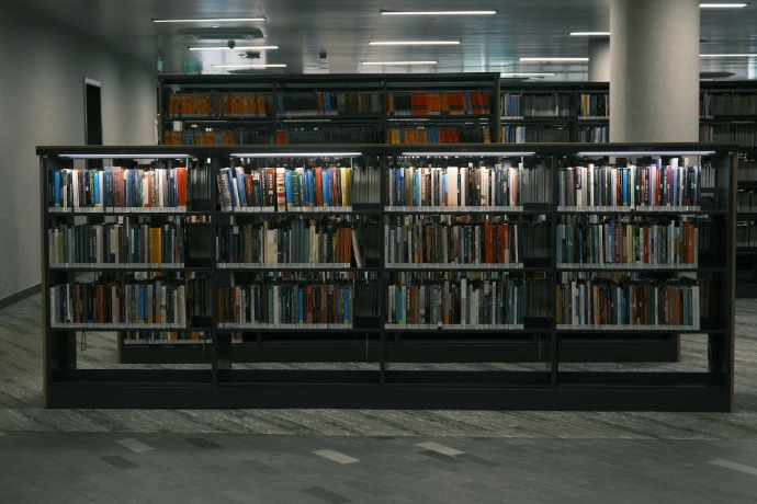 a row of bookshelves filled with lots of books